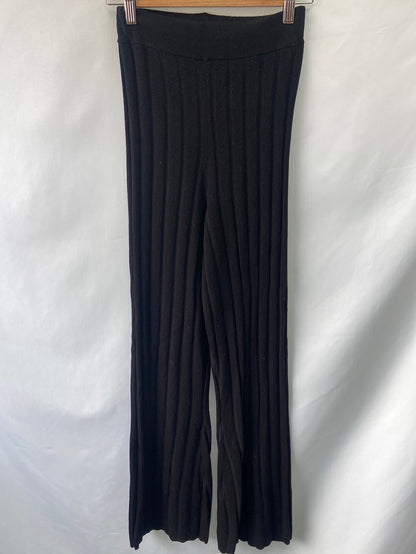 H&m.Pantalones negros punto canalé T.XS