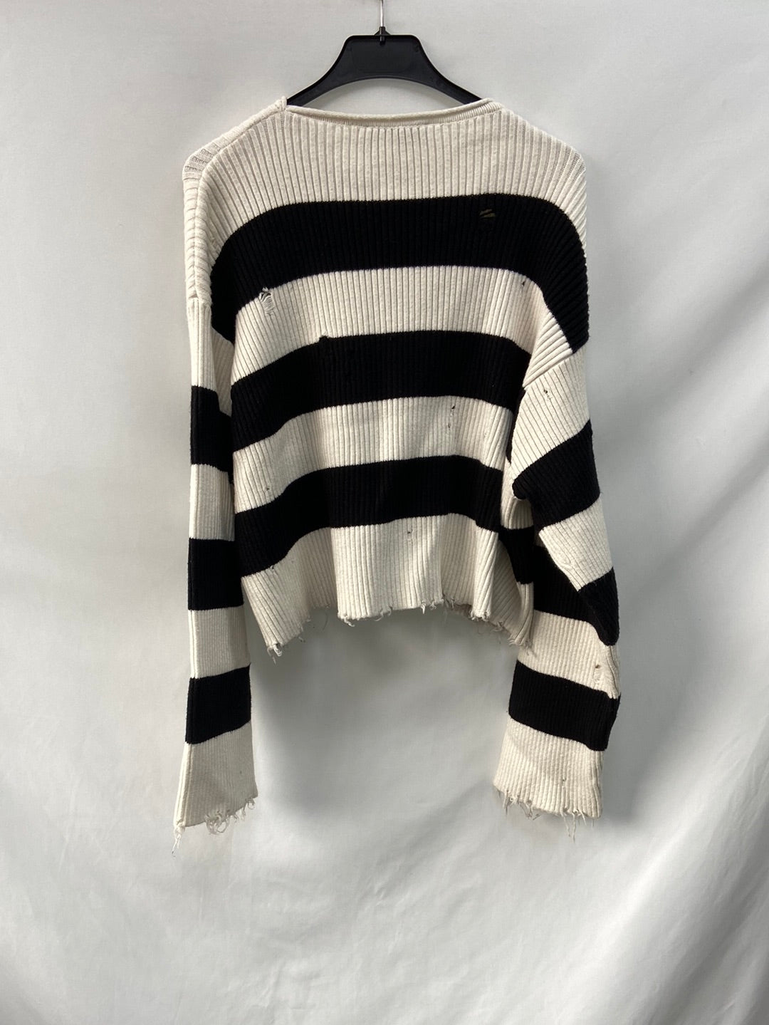 Striped knit sweater with ripped details Ts