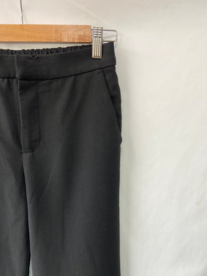 ZARA.Pantalones negros borlas T.XS