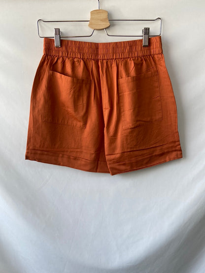 THINKING MU. Shorts fluido teja T.s