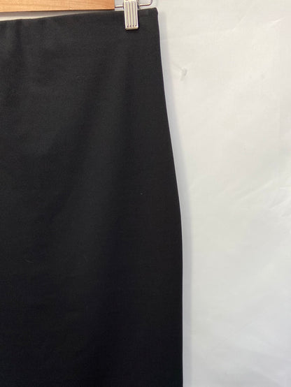 MUNMO.Falda tubo elástica negra midi T.m