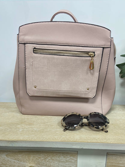 Market.OTRAS.Mochila rosa tipo bolso (Tara)