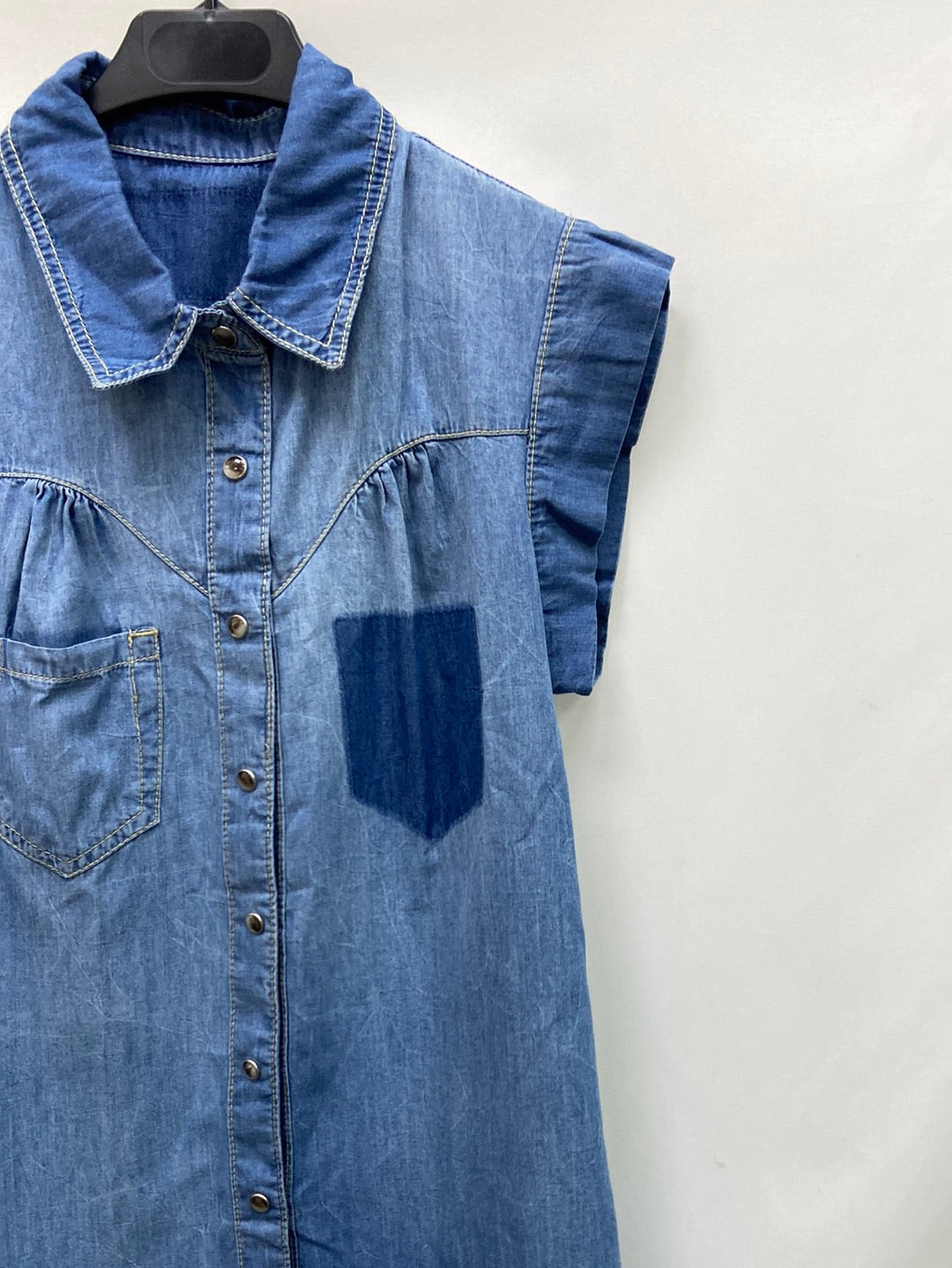 OTRAS.Blusa denim manga corta larguita T.S