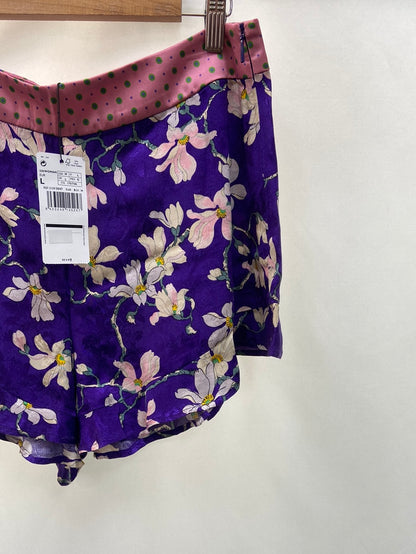 MANGO.Shorts morados Flores T.L