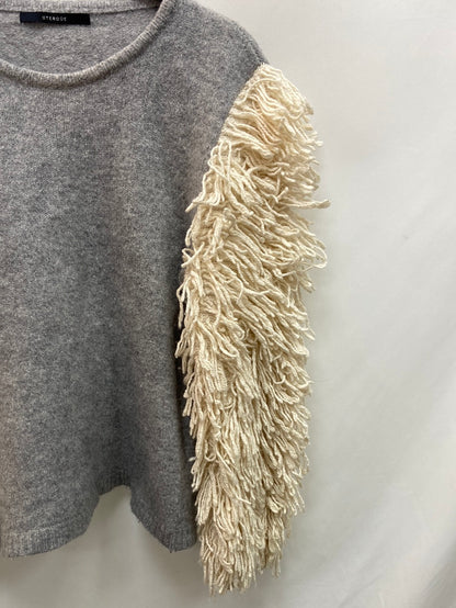 UTERQÜE.Jersey bicolor flecos T.S/M (Tara)