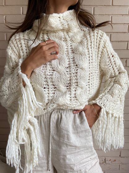 OTHERS. Your chunky fringed sweater