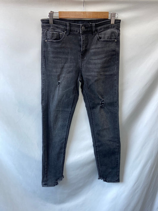 STRADIVARIUS.Pantalones pitillo grises T.38