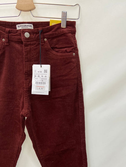 PULL&BEAR.Pantalones burdeos pana T.38