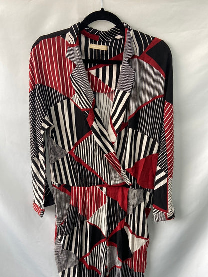 DOLORES PROMESAS. Mono rayas T.40