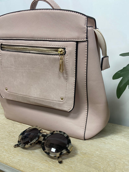 Market.OTRAS.Mochila rosa tipo bolso (Tara)