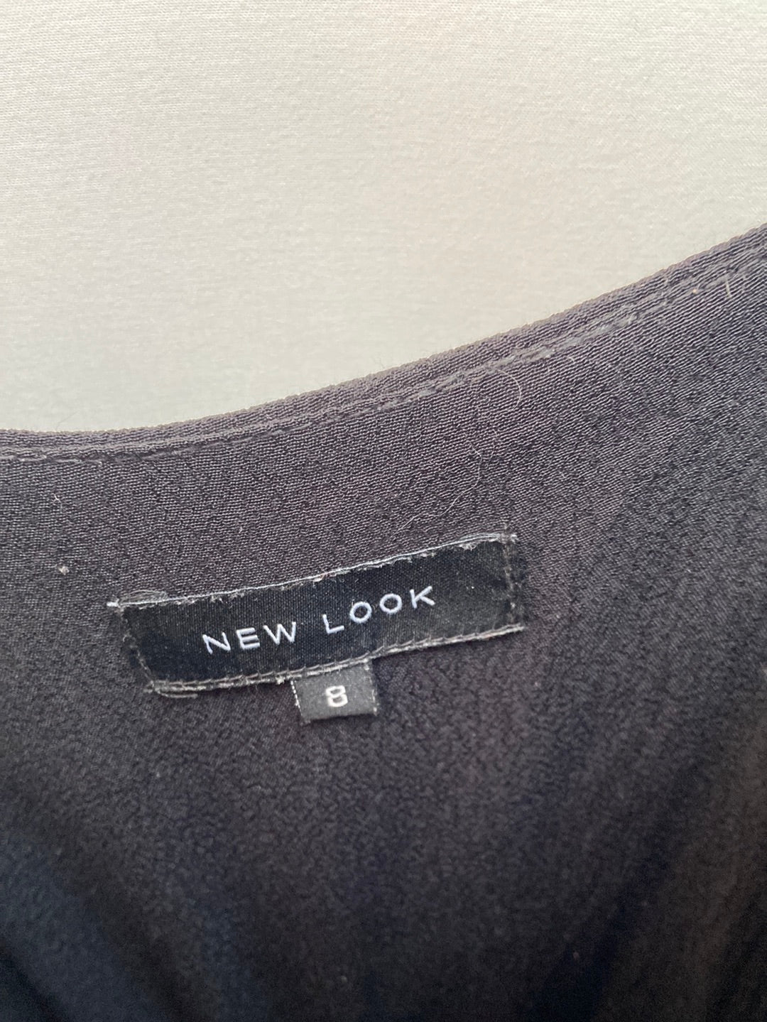 NEW LOOK.Mono corto negro flecos T.36