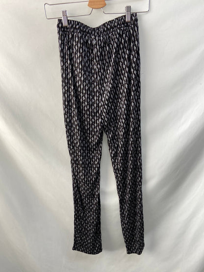 H&M. Pantalón elástico T. XS