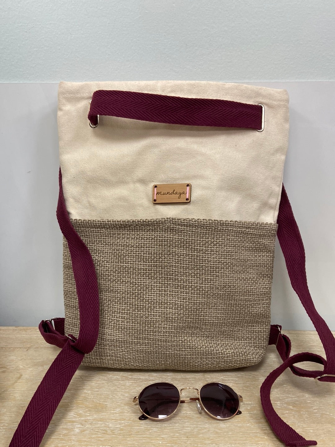 MUNDAYA. Double-textured backpacks