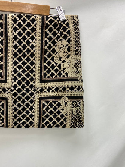 OTHERS. Printed short skirt Ts