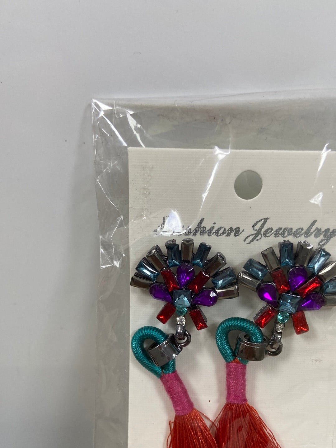 OTRAS.Pendientes abalorios y flecos