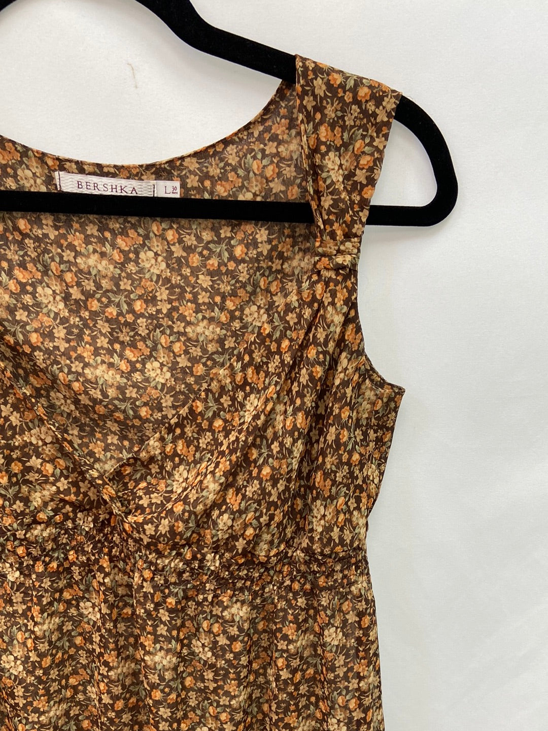 BERSHKA. Blusa tonos marrones semi tranparente T.l