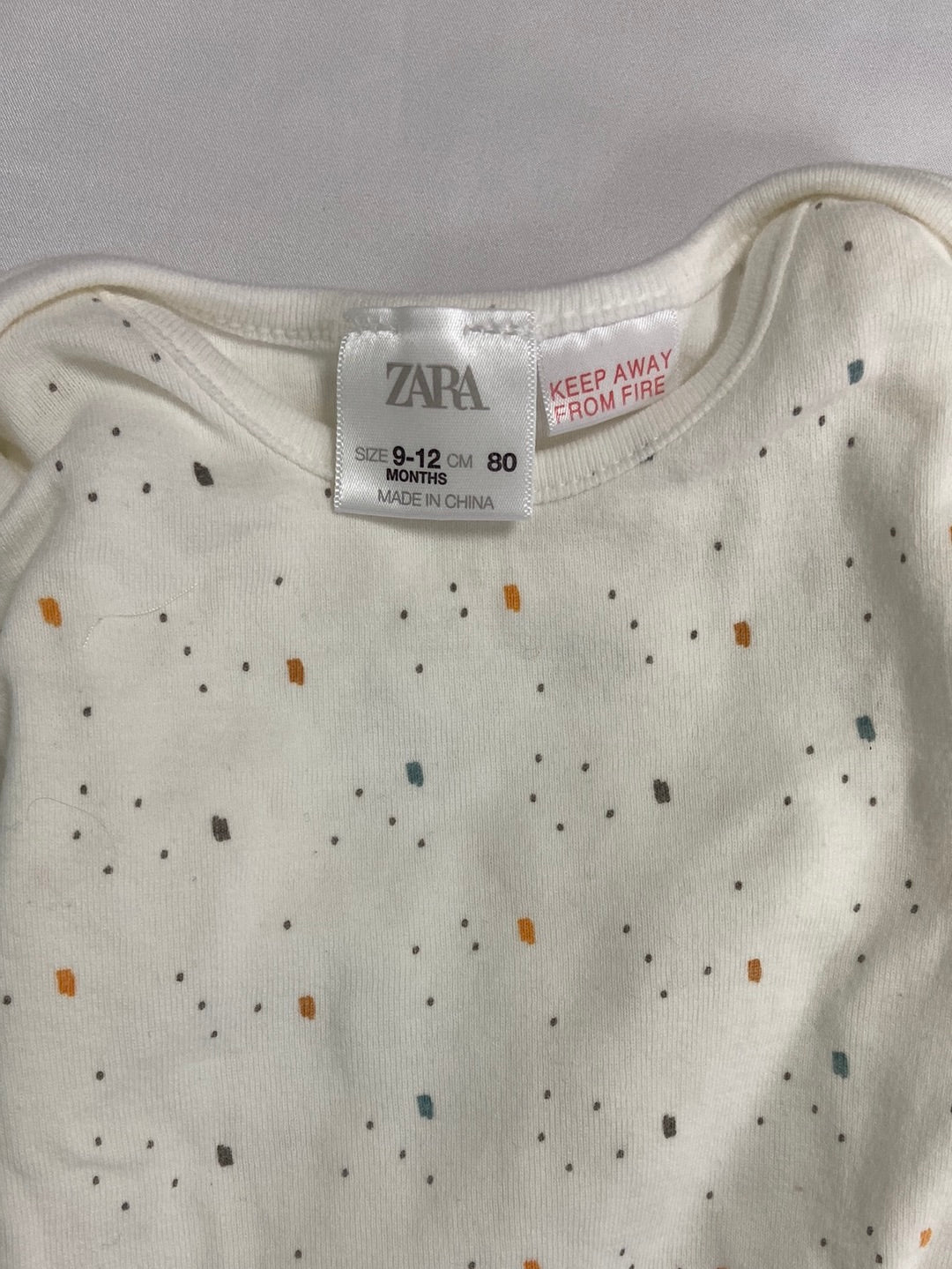 ZARA.White polka dot bodysuit S.9-12 months
