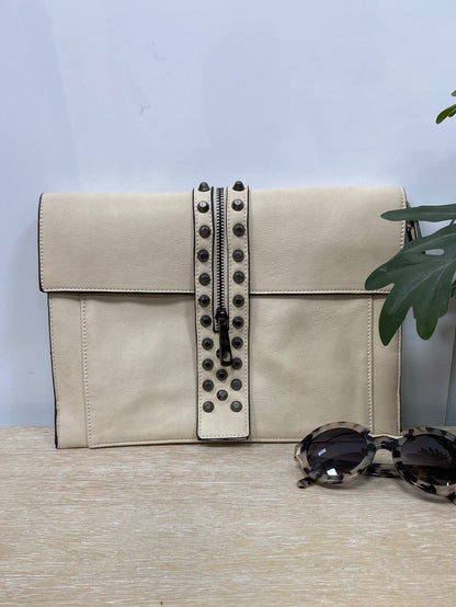 MISAKO. Beige bag with studs and zipper