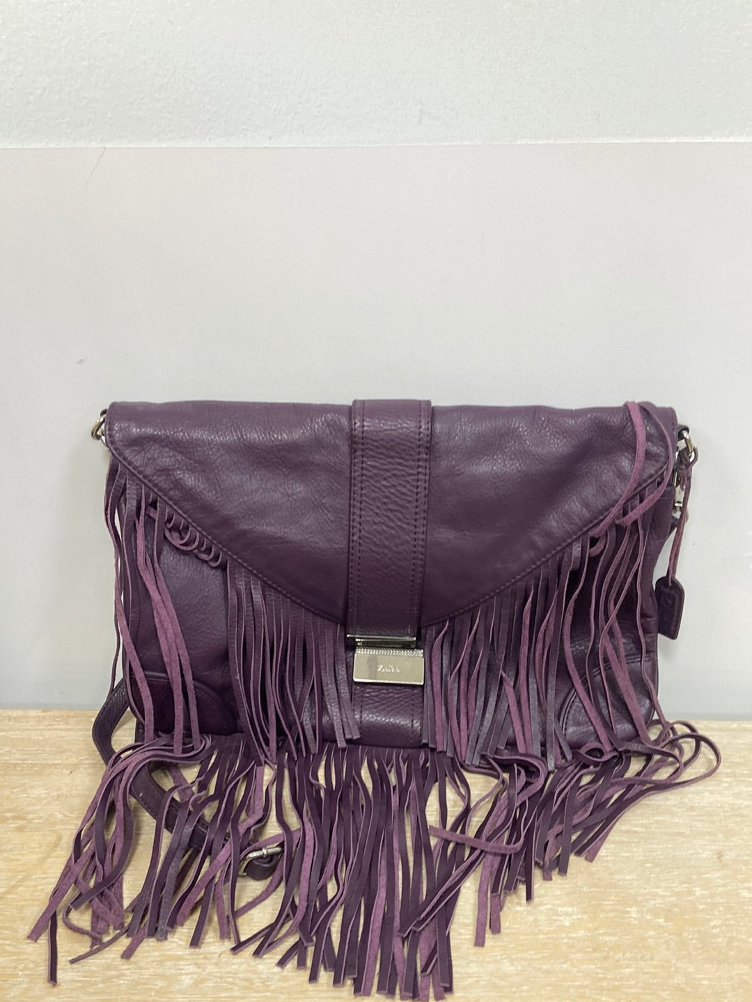 ZARA.Bolso morado flecos