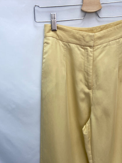 H&M.Pantalones fluidos amarillo pastel T.34
