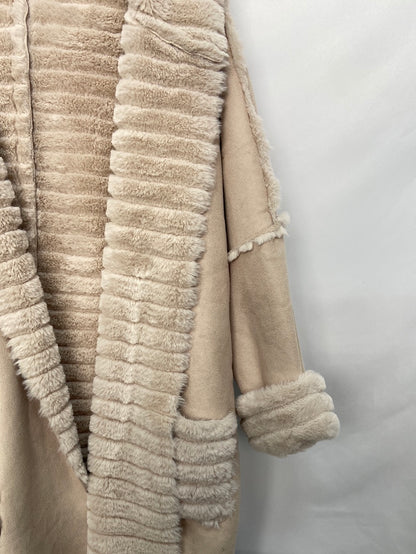 OTRAS.Abrigo reversible T.s/m