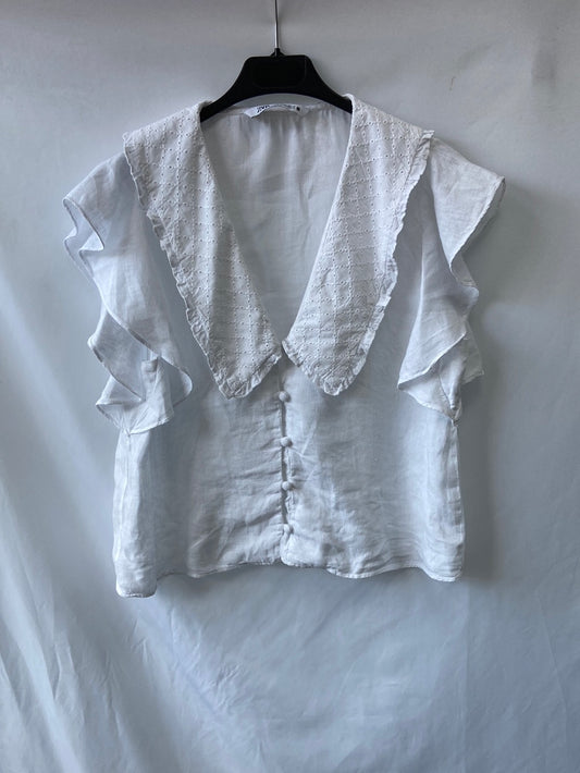 ZARA.Blusa cuello troquelado T.M