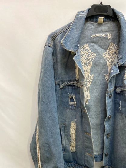 OTRAS.Cazadora vaquera efecto desgastado T.M
