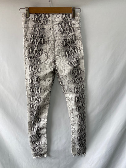 ZARA.Pantalones animal print T.34(32)