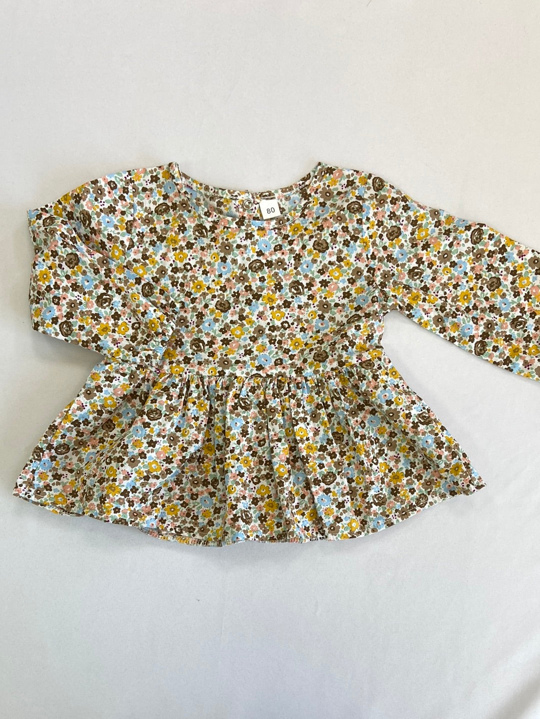 OTRAS.Blusa flores 80 cm