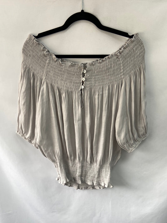 ZARA. Blusa cuello barco