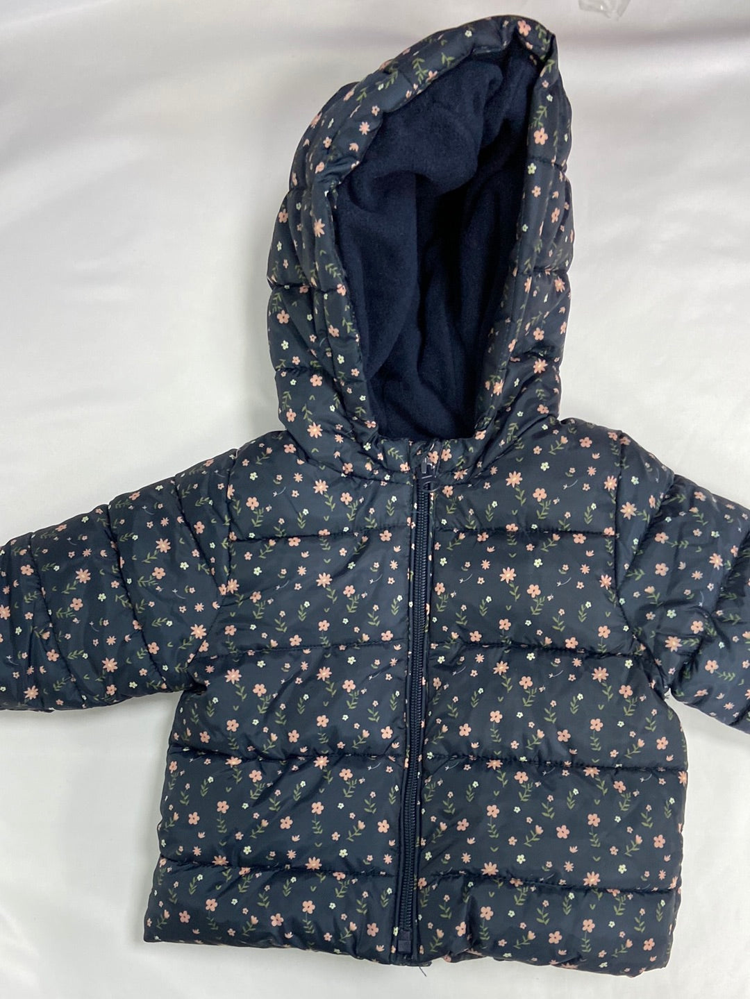 KIABI.Plumas flores 9 meses