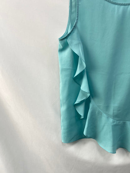 WHITE. Flowy blue Ts top