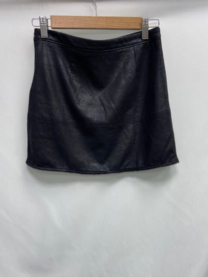 BERSHKA. Black suede Ts skirt