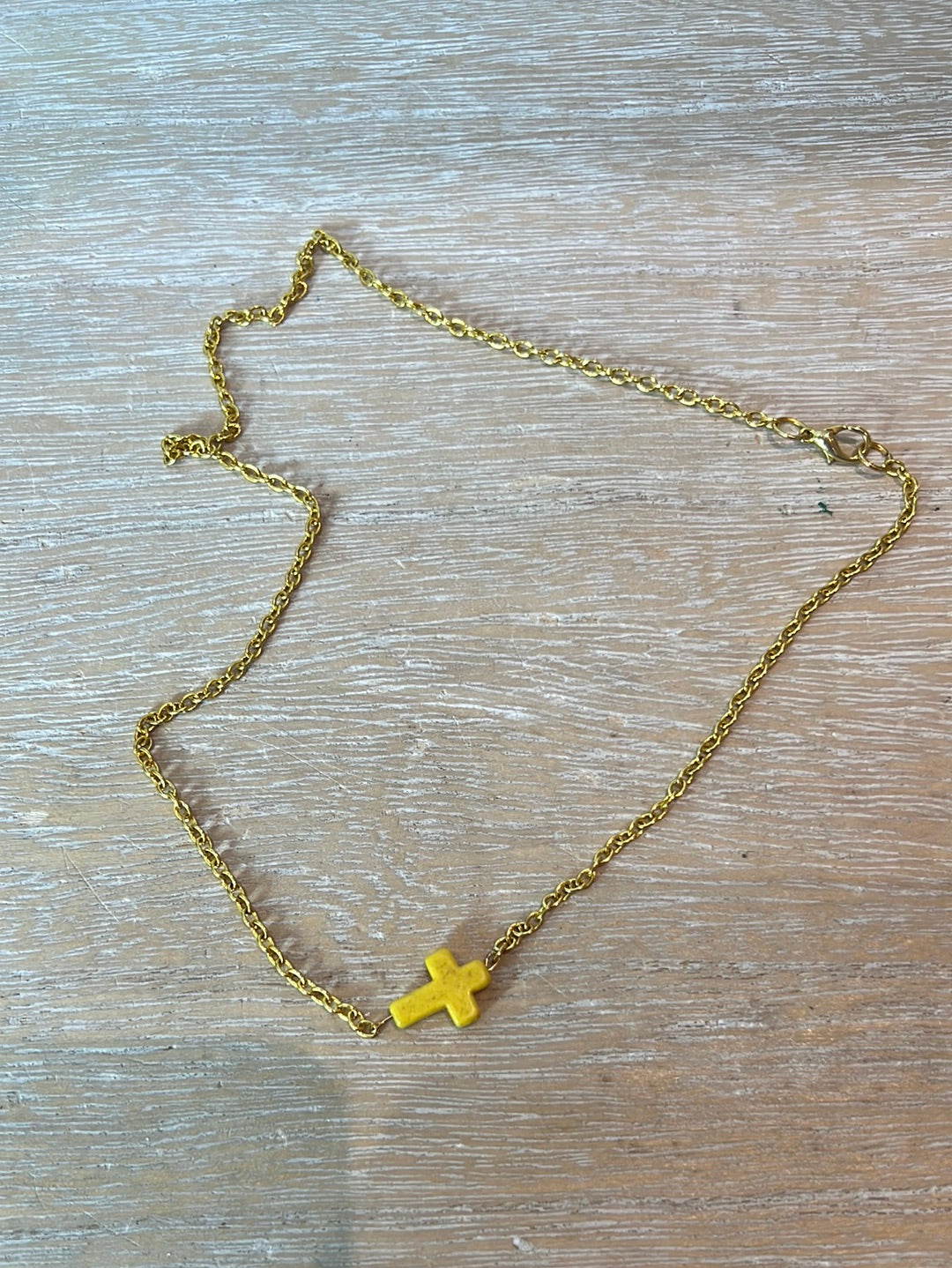 OTRAS. Colgante cruz