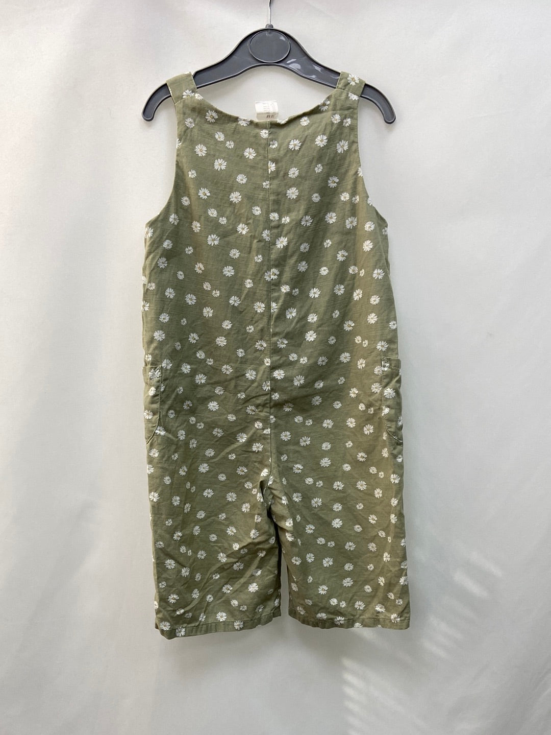 H&M.Peto flores 9-12 meses