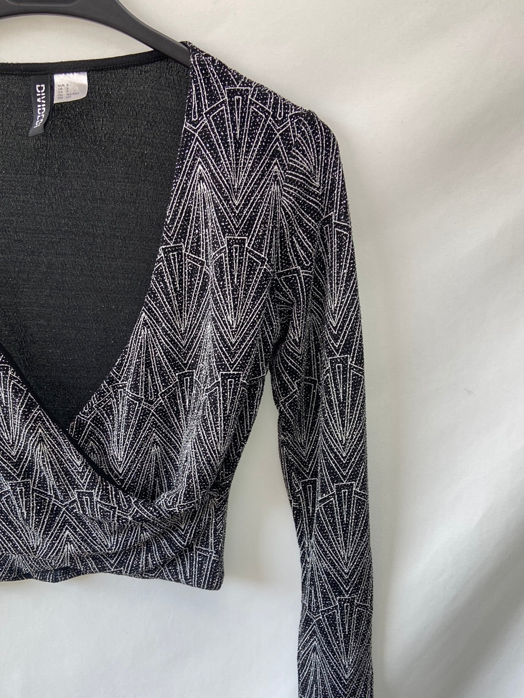 H&M.croptop hilos plateados T.S