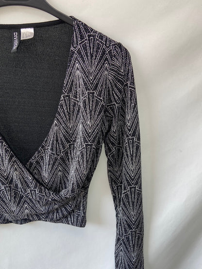 H&M.croptop hilos plateados T.S