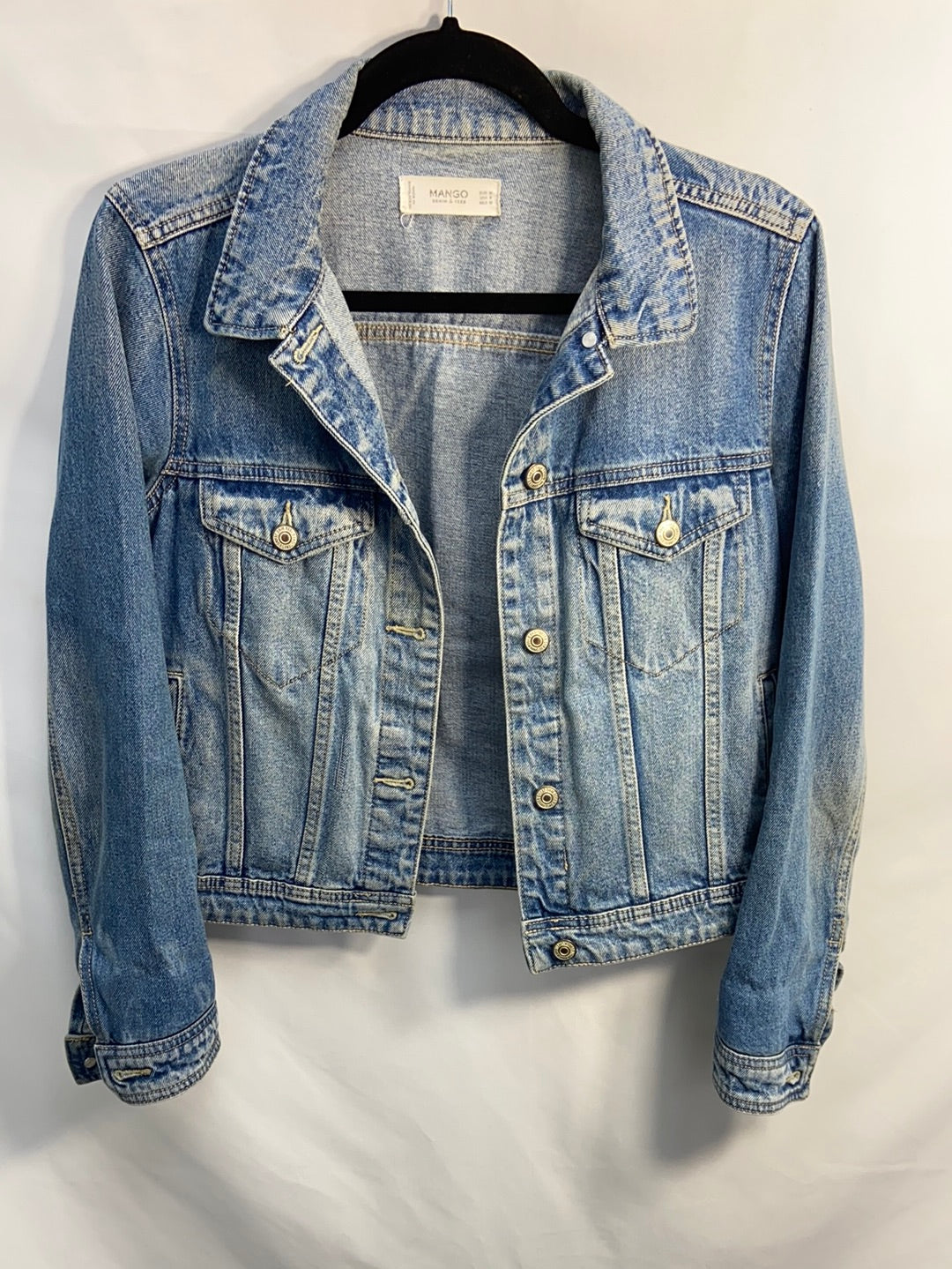 MANGO. Short distressed denim jacket TM