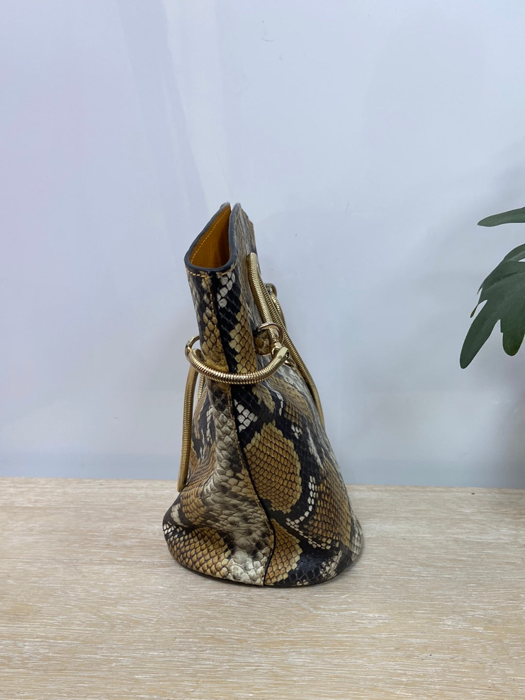 GEORGES RECH. Snake print sack bag
