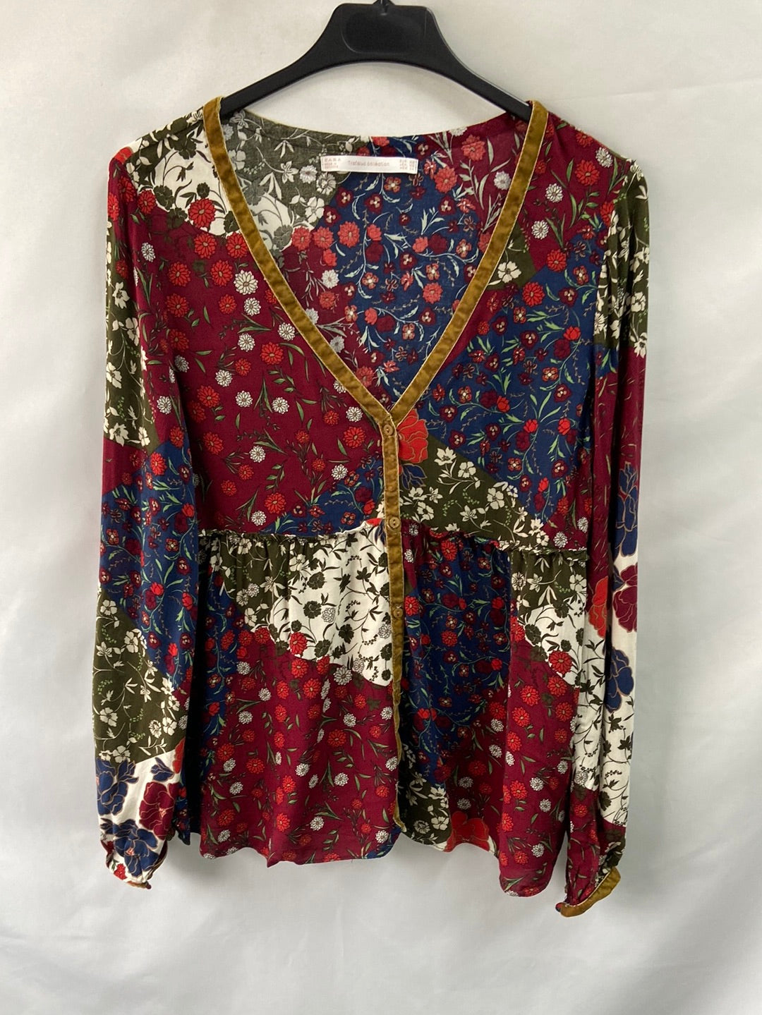 ZARA.Blusa multiestampado flores T.XS