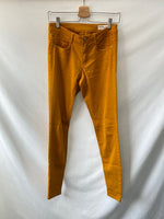 ZARA. Pantalones clásicos mostaza T.38