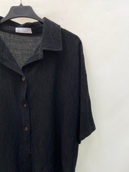 PRIMARK.Camisa negra fruncida T.38
