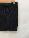MI&CO. Falda negra ajustada textura T.s
