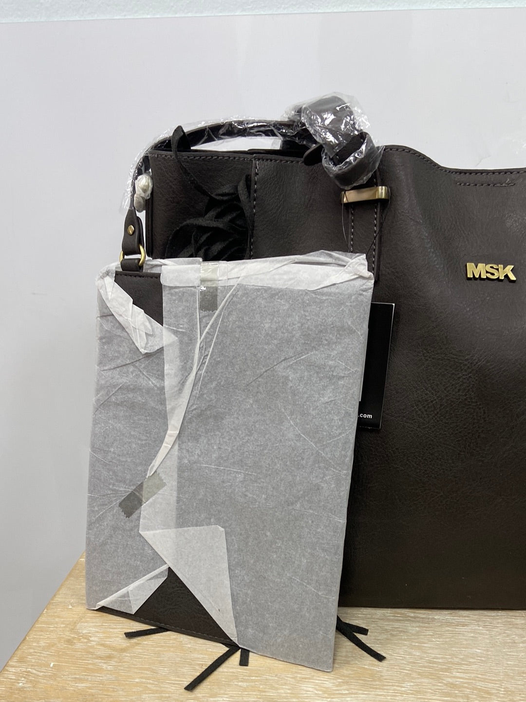MISAKO.Bolso marrón oscuro flecos