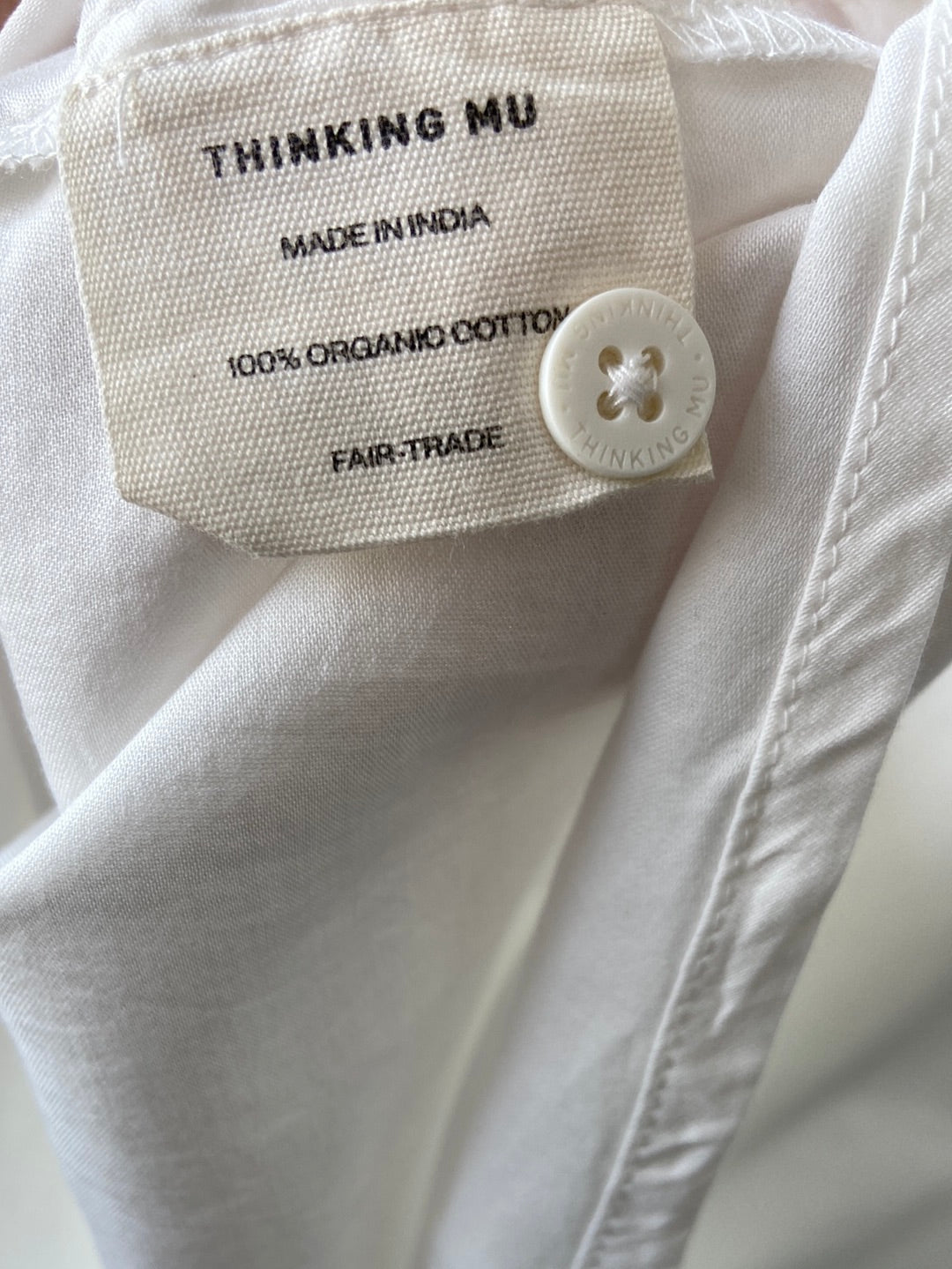 THINKING MU. Camisa blanca puños T.s