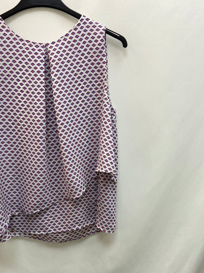 MANGO.Blusa sin mangas estampada T.XS