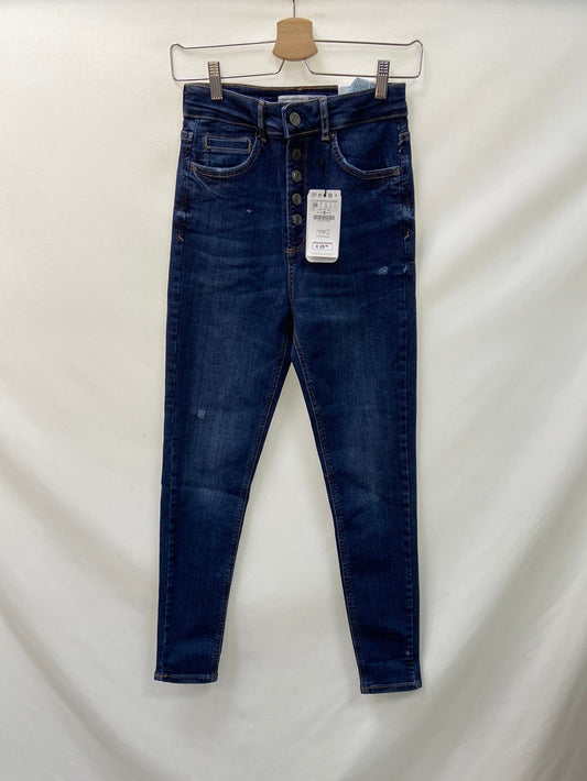 STRADIVARIUS.Pitillos denim oscuro abotonados T.38