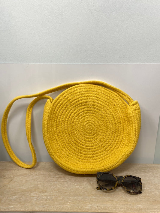 OTRAS.Bolso redondo amarillo