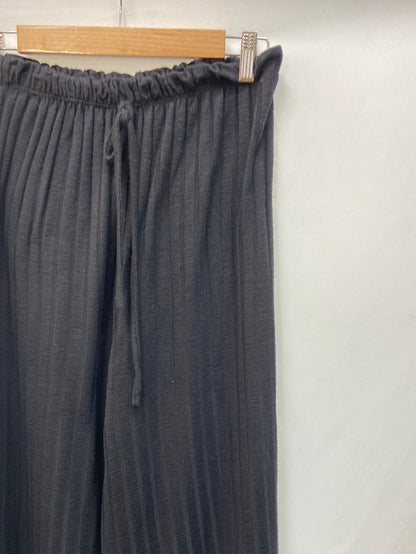 OTRAS.Pantalones canalé negros T.M/L