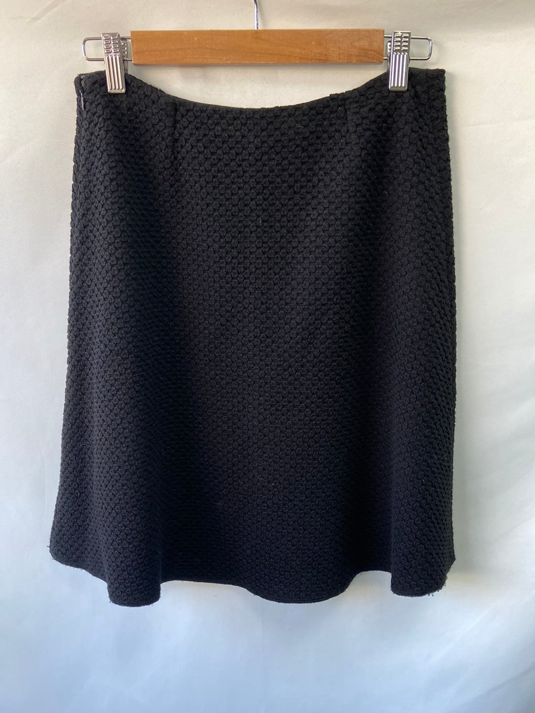 EMPORIO ARMANI. Black textured short skirt, size 44